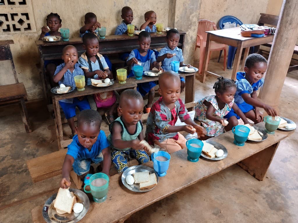 A child receiving a nutritious meal through the program